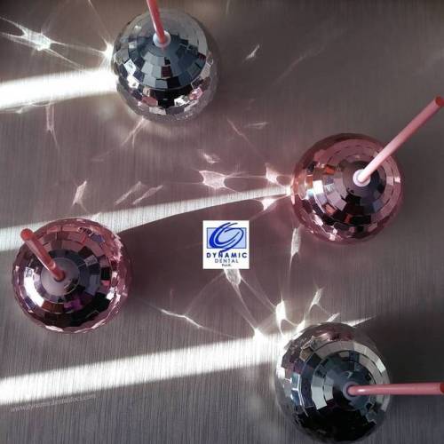 overhead view of disco ball glasses with straws